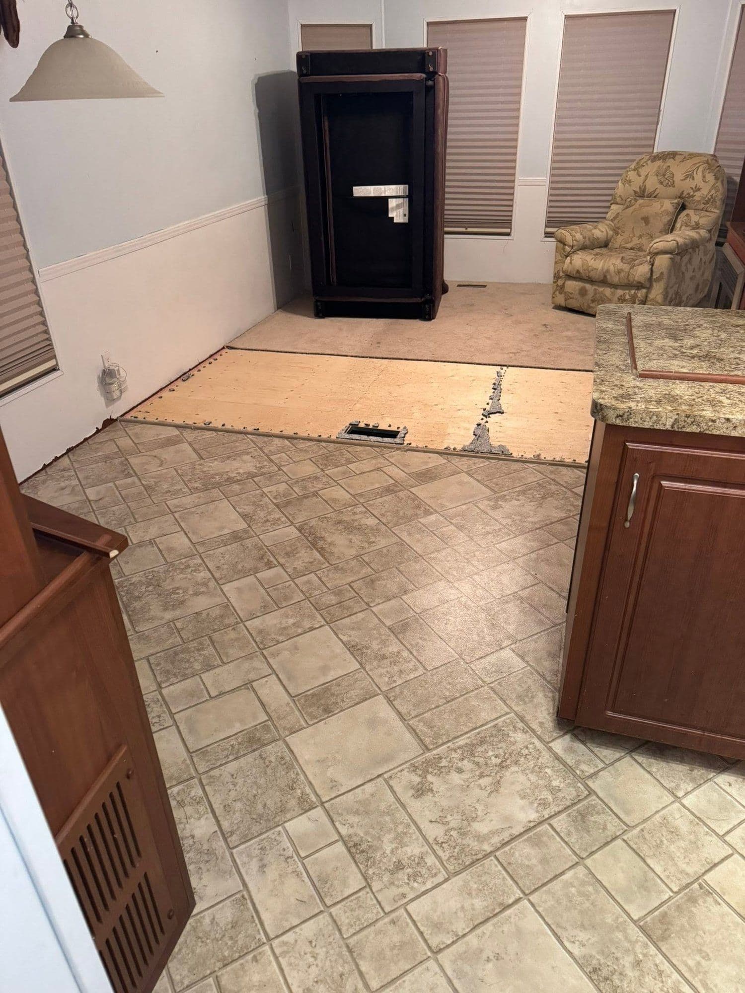 New tile floor being installed